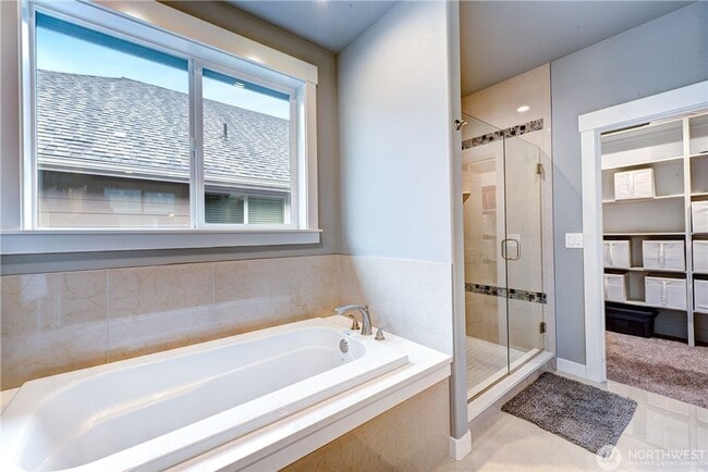 Building Photo - Luxury NW Living: 4 Bedroom Masterpiece with Dual Suites and Private Yard in Desirable Browns Point!