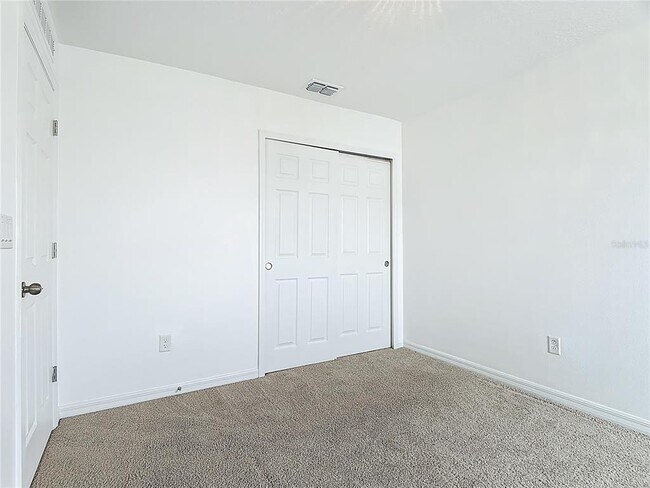 Building Photo - 2512 Blowing Breeze Ave