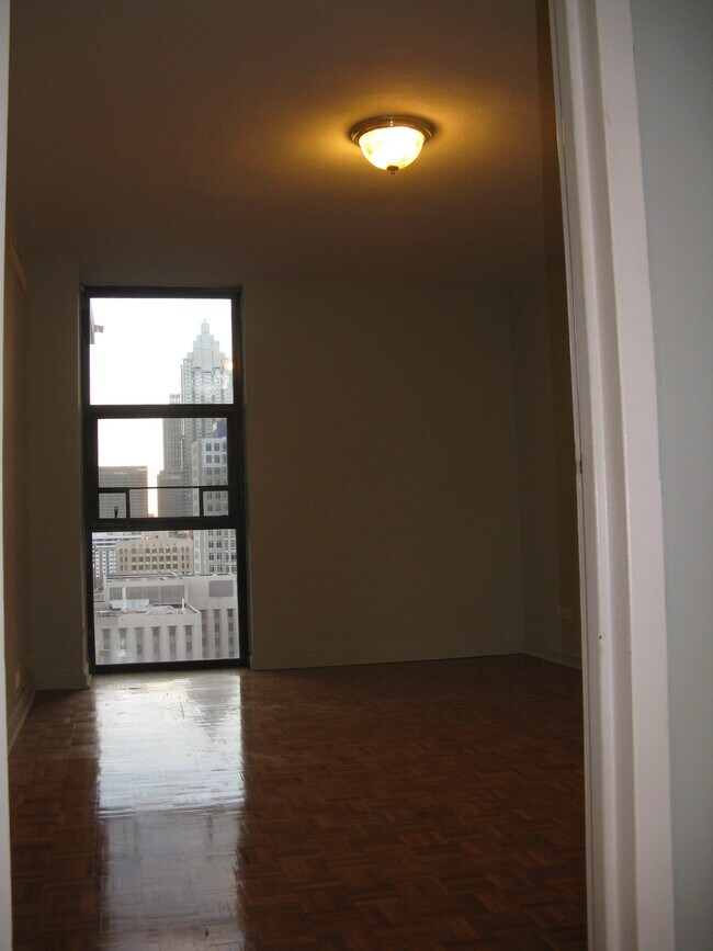 BR - floor to ceiling window - 620 Peachtree St NE