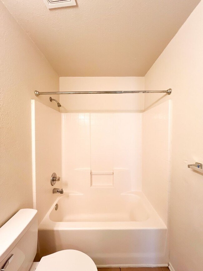 Building Photo - Available NOW!!!! Open floor plan features living room with fireplace, dining area, and large kit...