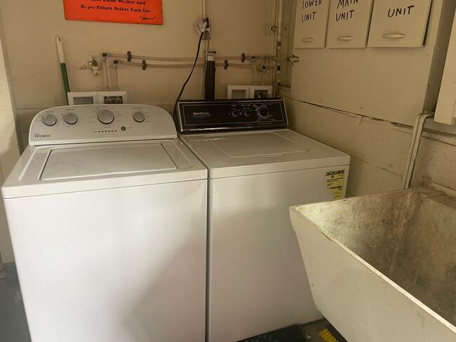 Laundry room with two washers and two dryers - 1111 NW 58th St