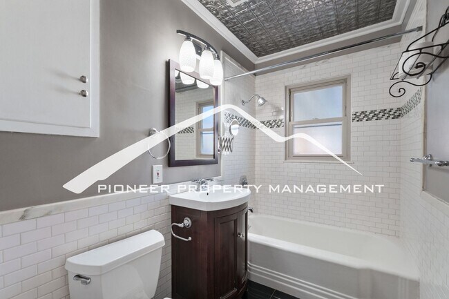 Building Photo - Downtown Charm with Private Yard, Oversized Garage and AC