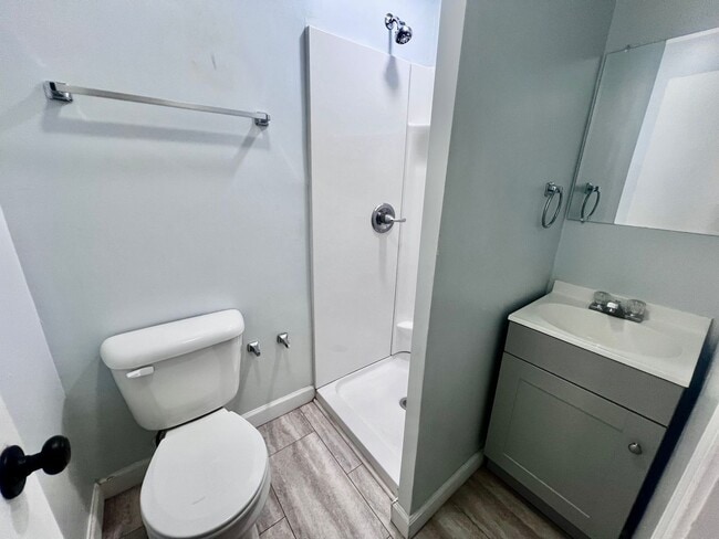 Building Photo - Three-bedroom, two-and-a-half bathrooms in...