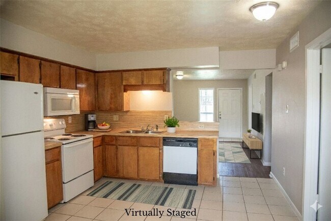 Building Photo - 1902 Woodsman Dr