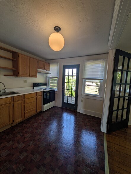 Kitchen towards entry - 1703 S Preston St