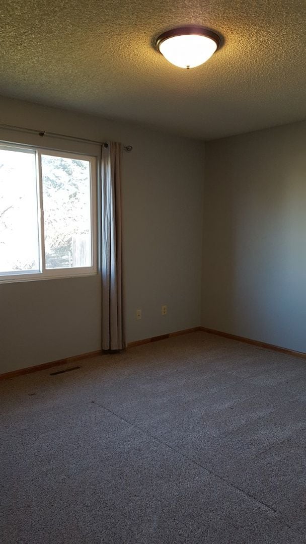 Building Photo - Bright 2 Bed, 2 Bath Home with Garage & Fenced Yard in Fort Collins