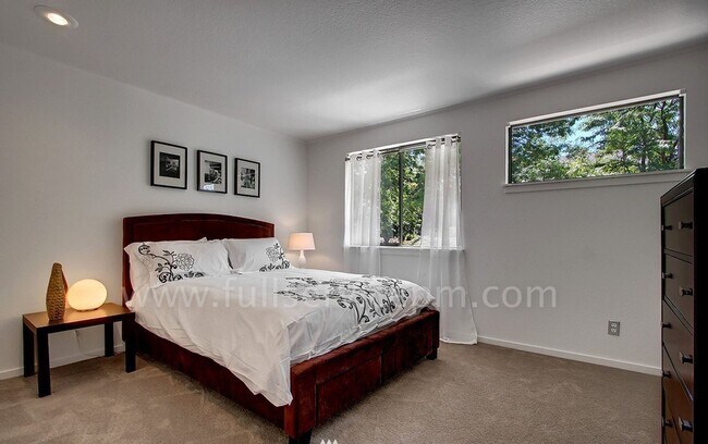 Building Photo - View Townhome Overlooking Genesee Park, Private Patio, Decks & Garage Parking