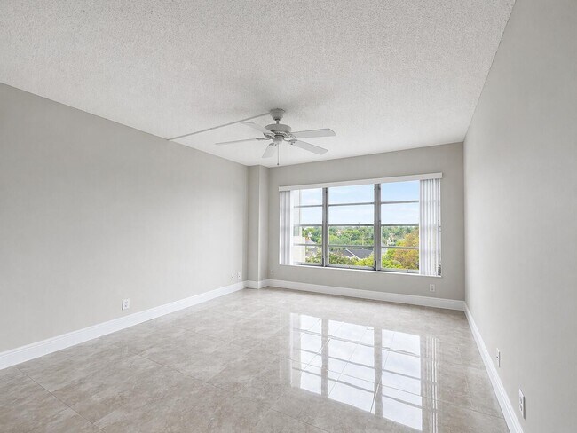 Building Photo - 10777 W Sample Rd