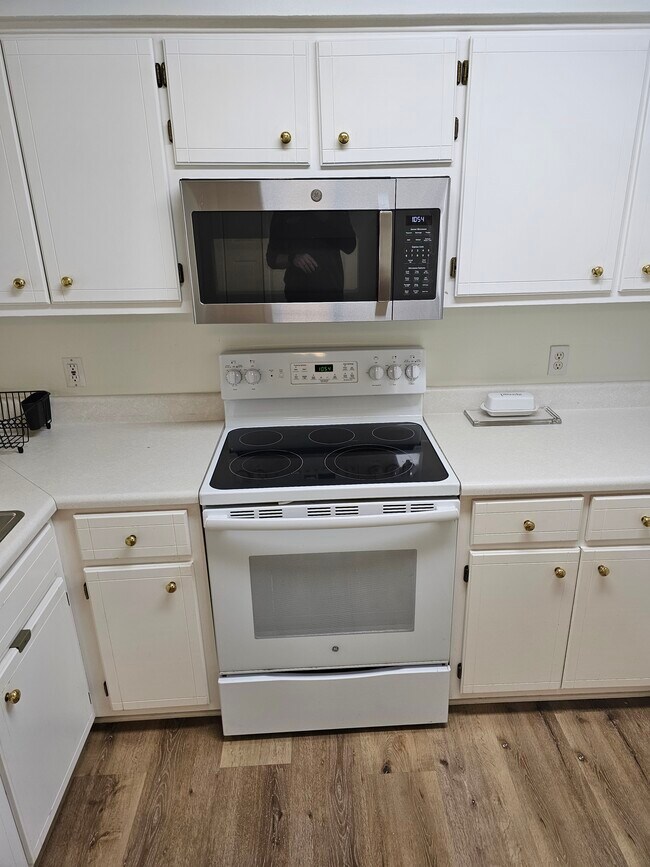 Glass top Stove and New Microwave - 21409 Marlin Ave
