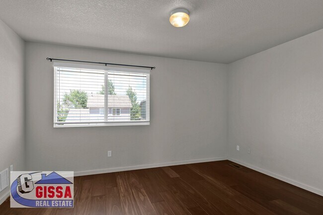 Building Photo - Cute home with engineered hardwood flooring throughout is available now!
