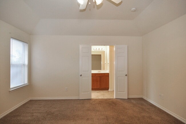 Building Photo - "Warm And Welcoming 3-2-2 With Open Living In a Prime Location!"