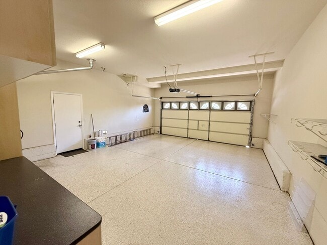 Building Photo - 5-Bed Gated Family Oasis | Prime Location & Backyard Space
