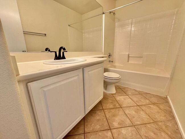 Building Photo - WELCOME TO THIS SPACIOUS 4-BEDROOM, 2.5-BA...