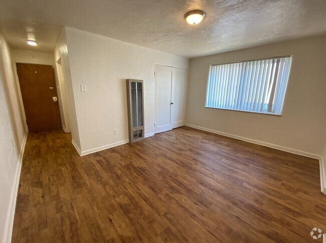 Living Room w/ extra storage closet