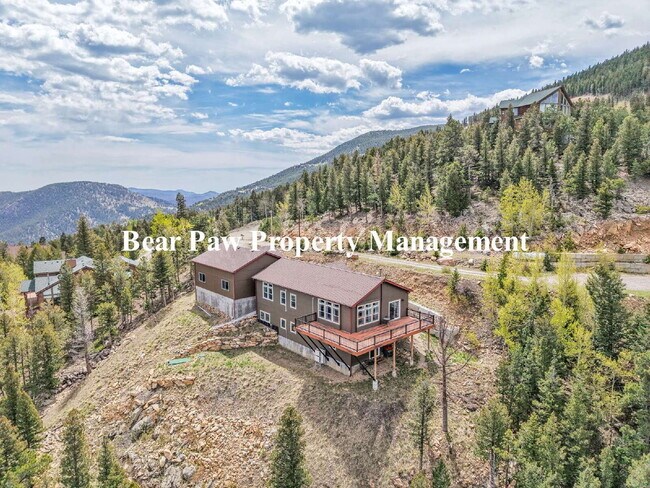 Building Photo - "Experience Mountain Living at Its Finest ...
