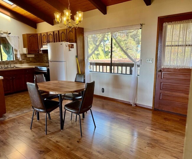 Building Photo - Experience comfort in this charming 3 bed, 2 bath rental home with a wood-burning stove, sunken j...