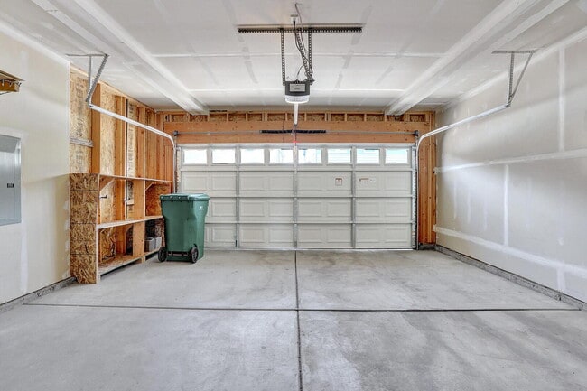 Building Photo - Modern Townhome with Central A/C, 2-Car Ga...
