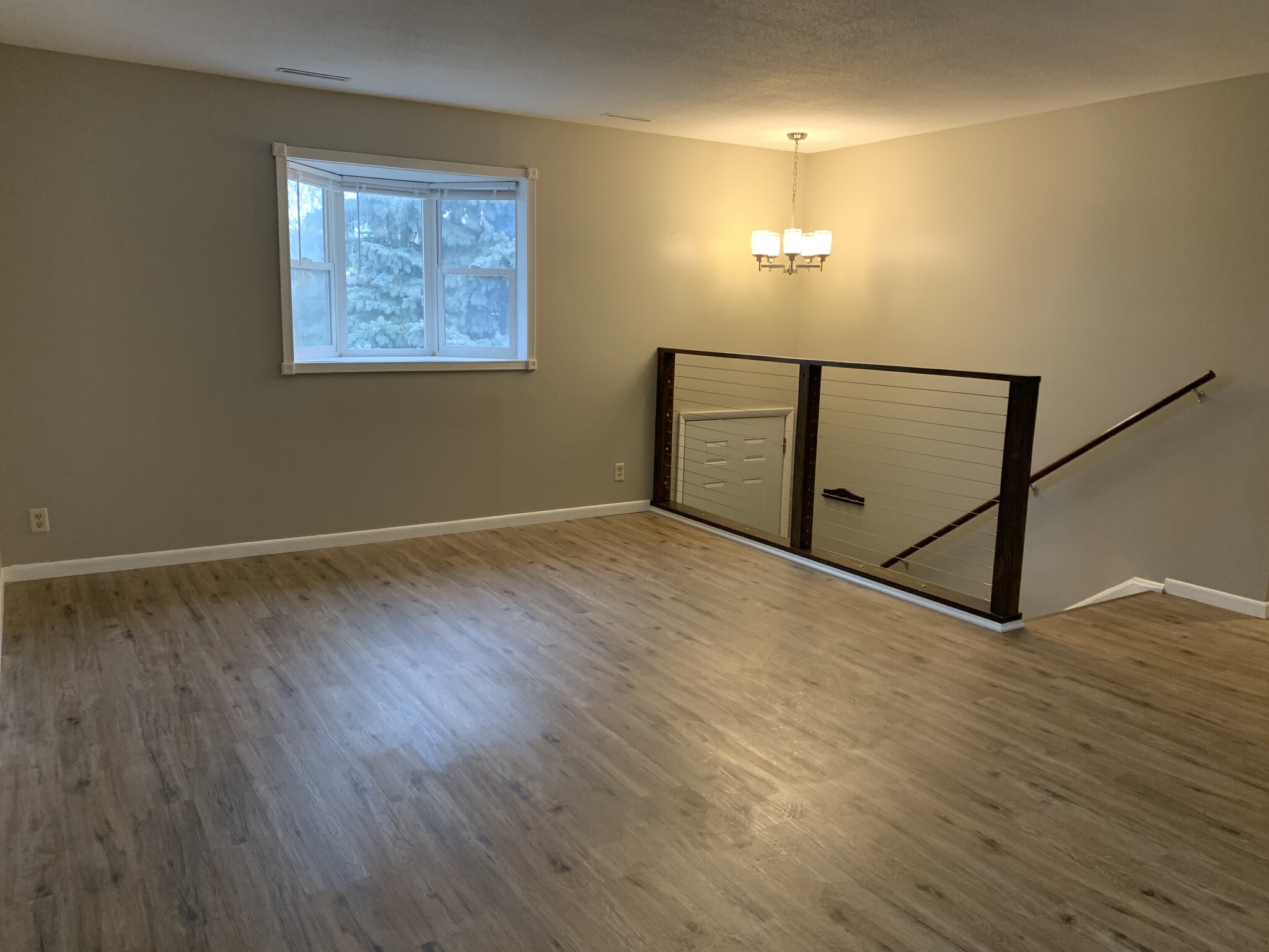 Living room with cable railing - 4832 Ginny ave