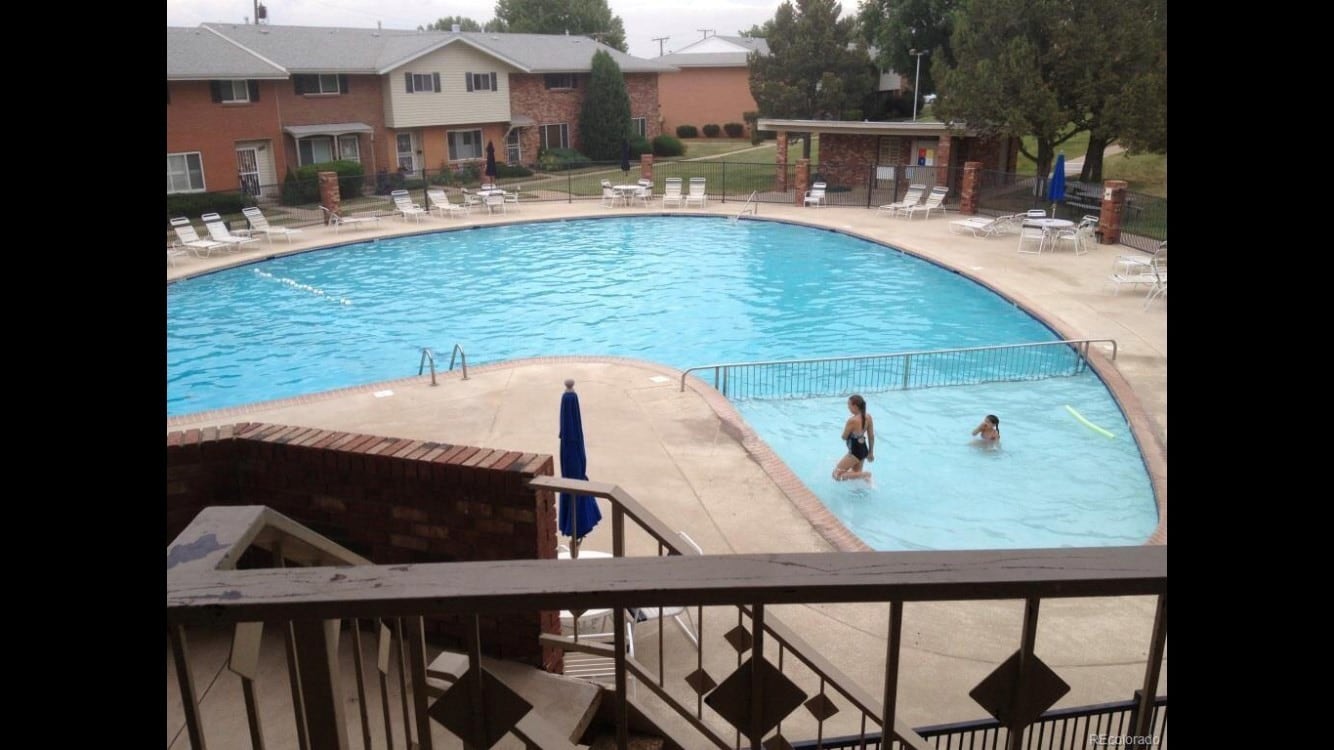 Large swimming pool next to clubhouse - 3930 S Yosemite St