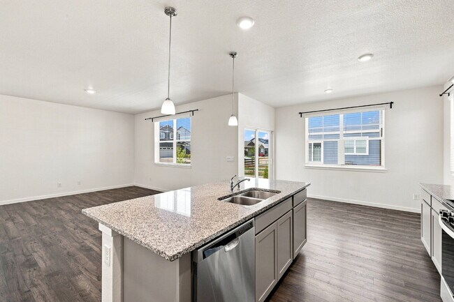 Building Photo - Spacious 4 Bedroom, 2.5 Baths in Bennett! 3 Car Attached Garage. Corner Lot!