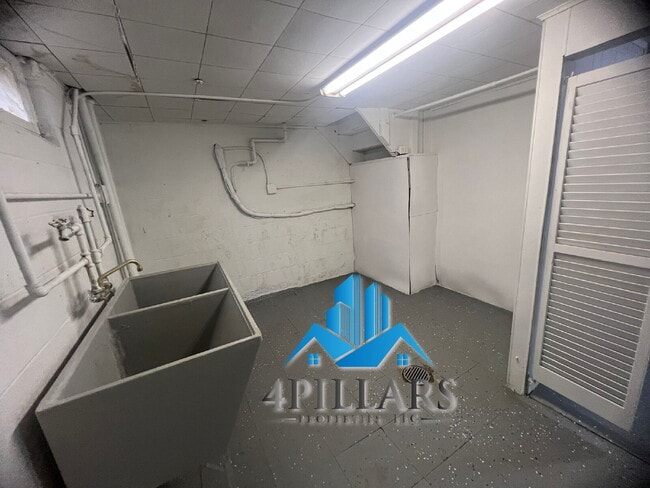 Building Photo - "Charming 2-Bedroom Gem with Finished Basement & Gleaming Hardwood Floors in Hammond!"