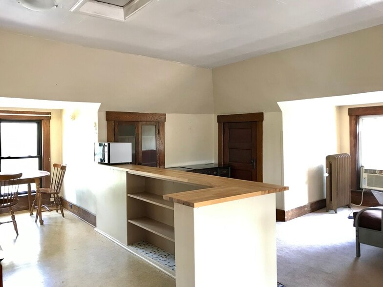 butcher block countertop on kitchen peninsula separates kitchen from living area - 350 Cobun Avenue