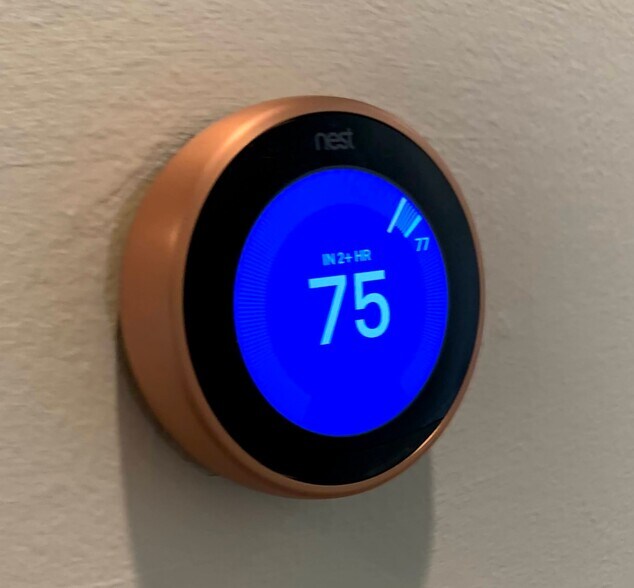 Nest smart thermostats, home has two separate A/C units for top and bottom floor - 6121 Hamman St