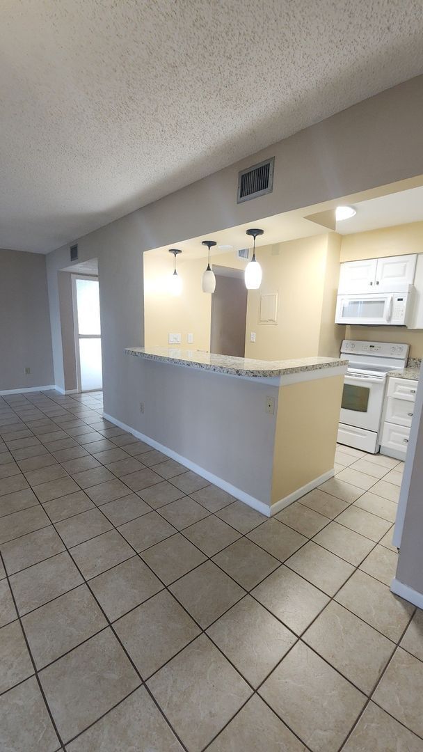 Building Photo - Conquistador 2 Bed 2 Bath - Just steps from the pool!