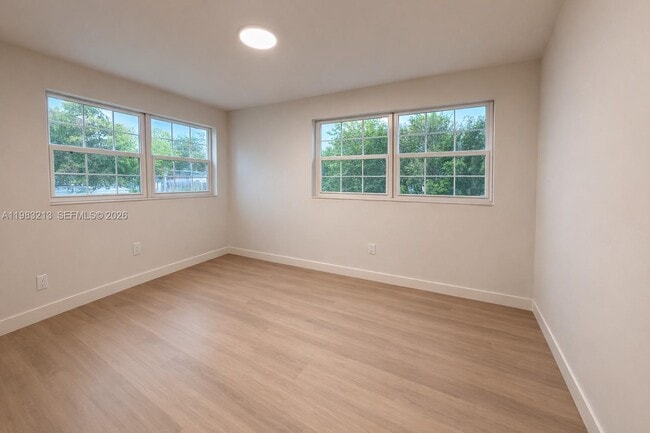 Building Photo - 6885 NW 14th Ct