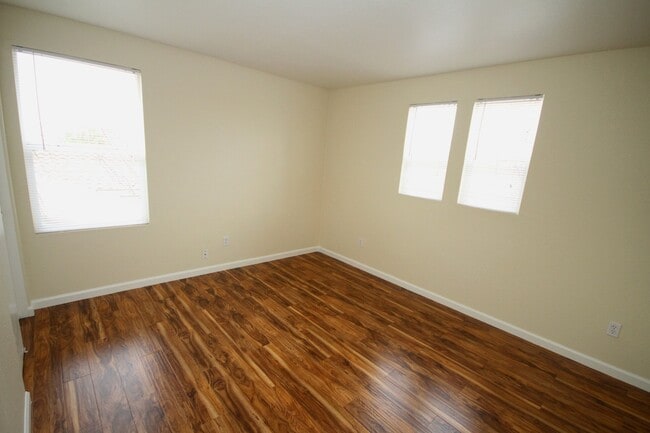 Building Photo - 4 Bed| 2.5 Bath | 2061 SF | 2 Car Garage | Long driveway with gate | Tenant pays $175 monthly for...