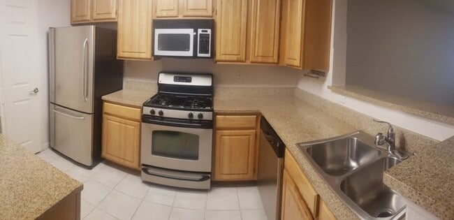Building Photo - TANAMERA CONDOMINIUMS 1 bed 1 bath 1 car g...