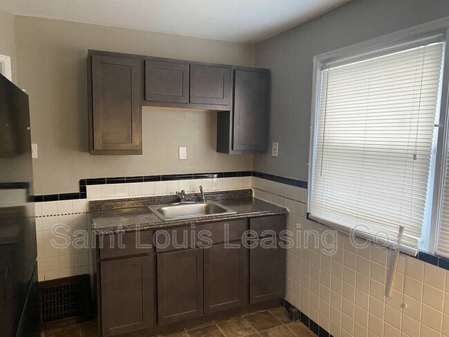 Building Photo - 7411 Jenwood Ave