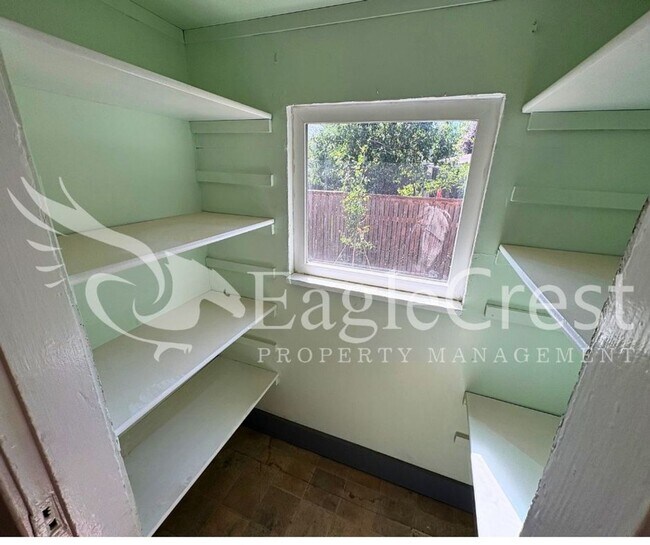 Building Photo - Charming Historic 4-Bedroom Home with Fenced Yard & Chicken Coop