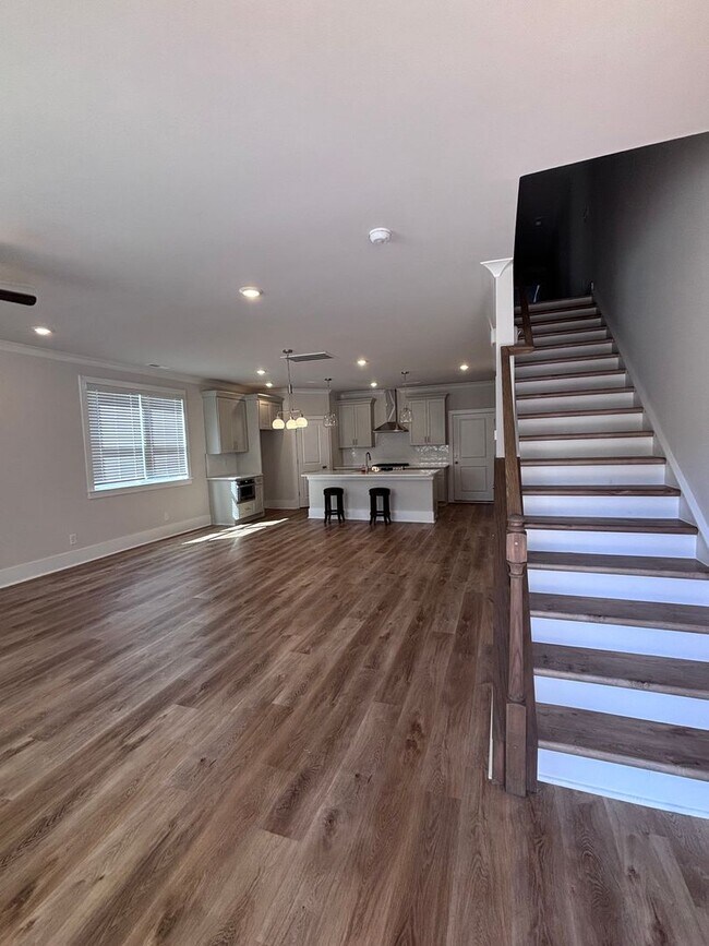 Building Photo - Brand new three-bedroom, 2.5-bath townhome