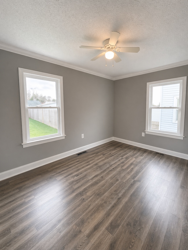 Building Photo - Updated 2BR Home with Finished Basement and 2-Car Garage