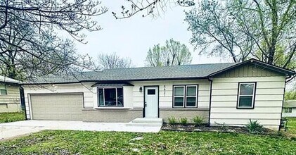 Building Photo - Welcome Home to Comfort, Space & Style!