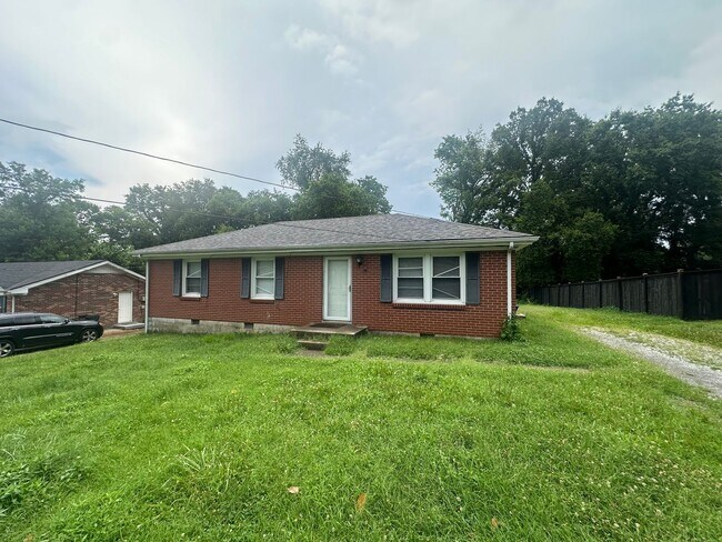 Building Photo - 4 Bedroom and 2 Bath home with large yard