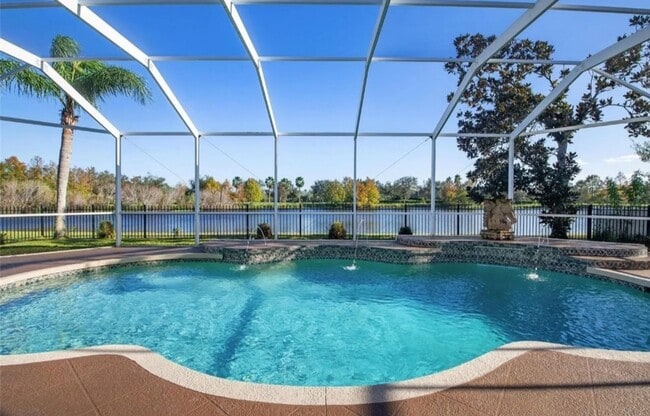 Building Photo - NORTH PORT - Rare Waterfront 4 bedroom pool home Annual/Unfurnished