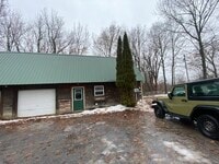 Building Photo - Spacious 3 bedroom 2 bath with 1 stall garage duplex outside city of Watertown for rent!