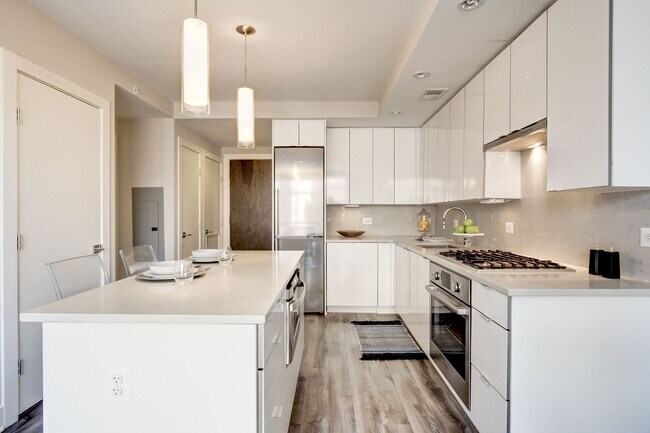 Building Photo - Live in Luxury at Logan 13