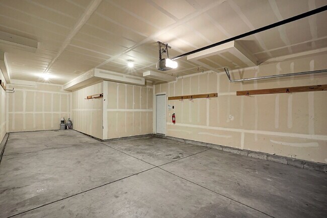 Building Photo - $2,490.95 - 4 Bed, 2.5 Bath Home in CO Springs with Fenced in Yard and 3 Car Garage!