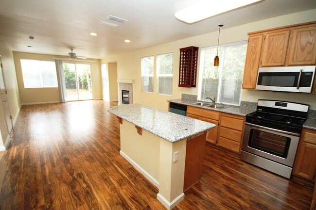 Building Photo - 4 Bed| 2.5 Bath | 2061 SF | 2 Car Garage | Long driveway with gate | Tenant pays $175 monthly for...