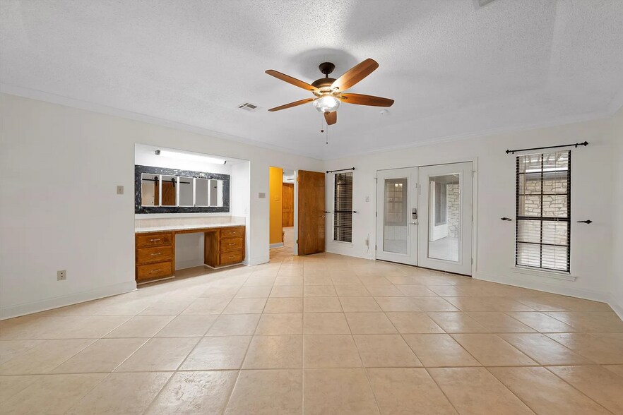Main Bedroom Built-in Raised Ceiling With Great-Room Fan French Doors To Back Covered Patio - 273 Leafy Hollow Ln