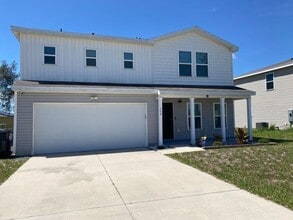 Building Photo - Four Bedroom / Three Bath Home