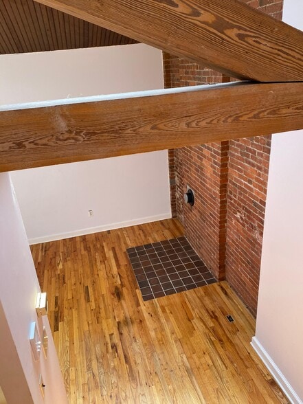 view of loft to living room - 134 Washington St