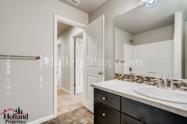 Building Photo - Charming 4-Bedroom Home Near Parks and Tra...