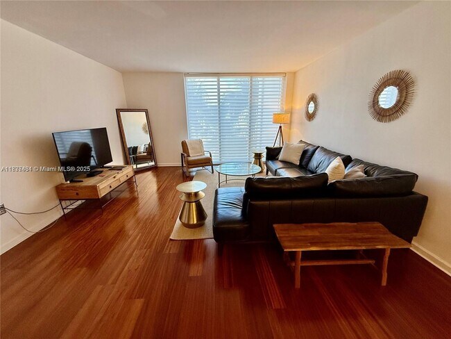 Building Photo - 10275 Collins Ave