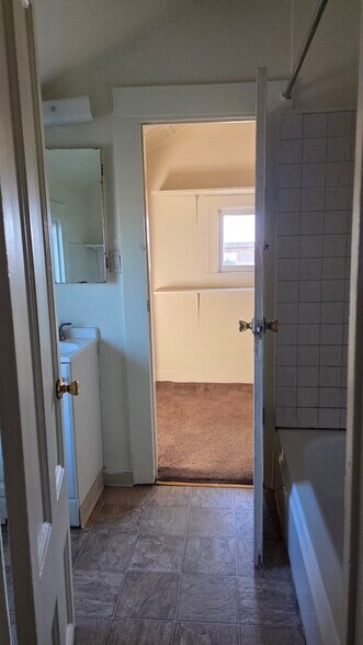 Bathroom leading to walk in closet - 2440 12th Ave