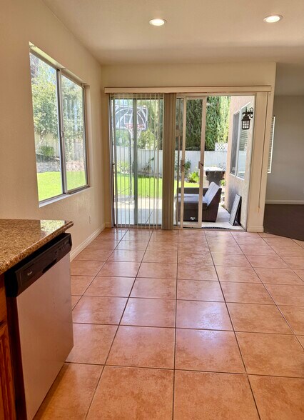 Kitchen leading to backyard - 30863 Orleans Ct