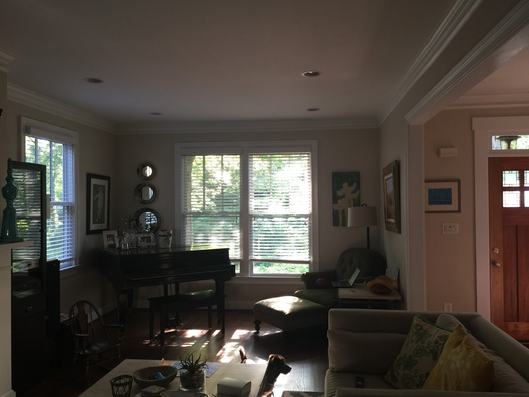 Spacious living room with a large fireplace, wall mounted TV rack and plenty of windows. - 945 Longley Ave NW